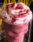 Sauce Boss Gang Inferno Dust on a strawberry daiquiri with whip cream