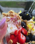 Sauce Boss Gang inferno Dust seasoning on a yogurt parfait.