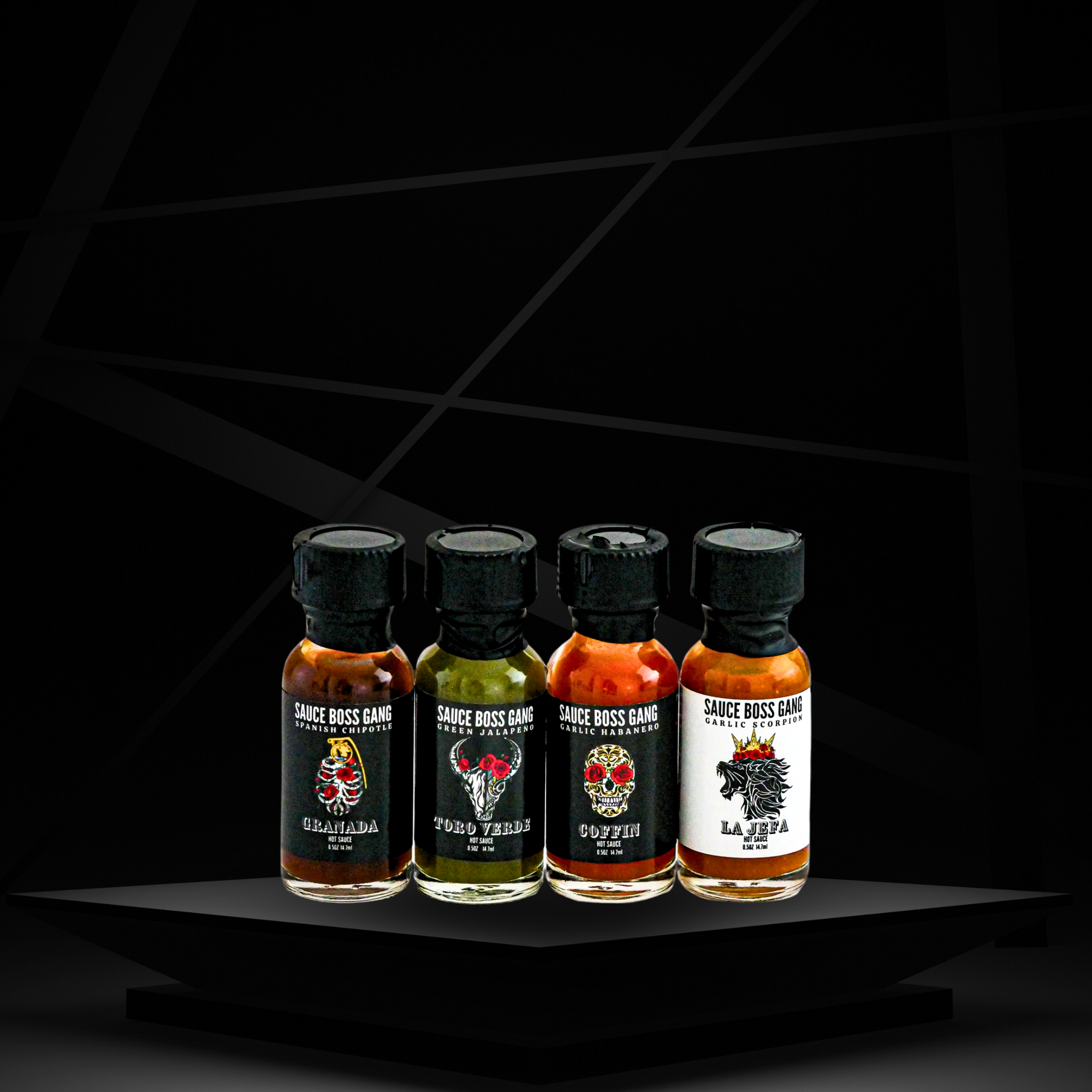 granada spanish chipotle  travel size hot sauce, toro verde jalapeno travel size hot sauce, coffin travel size habanero hot sauce and La Jefa garlic scorpion travel size hot sauce collection front view.