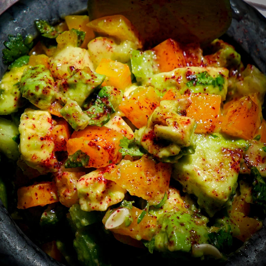 Guacamole with Sauce Boss Gang hibiscus ghost pepper seasoning .