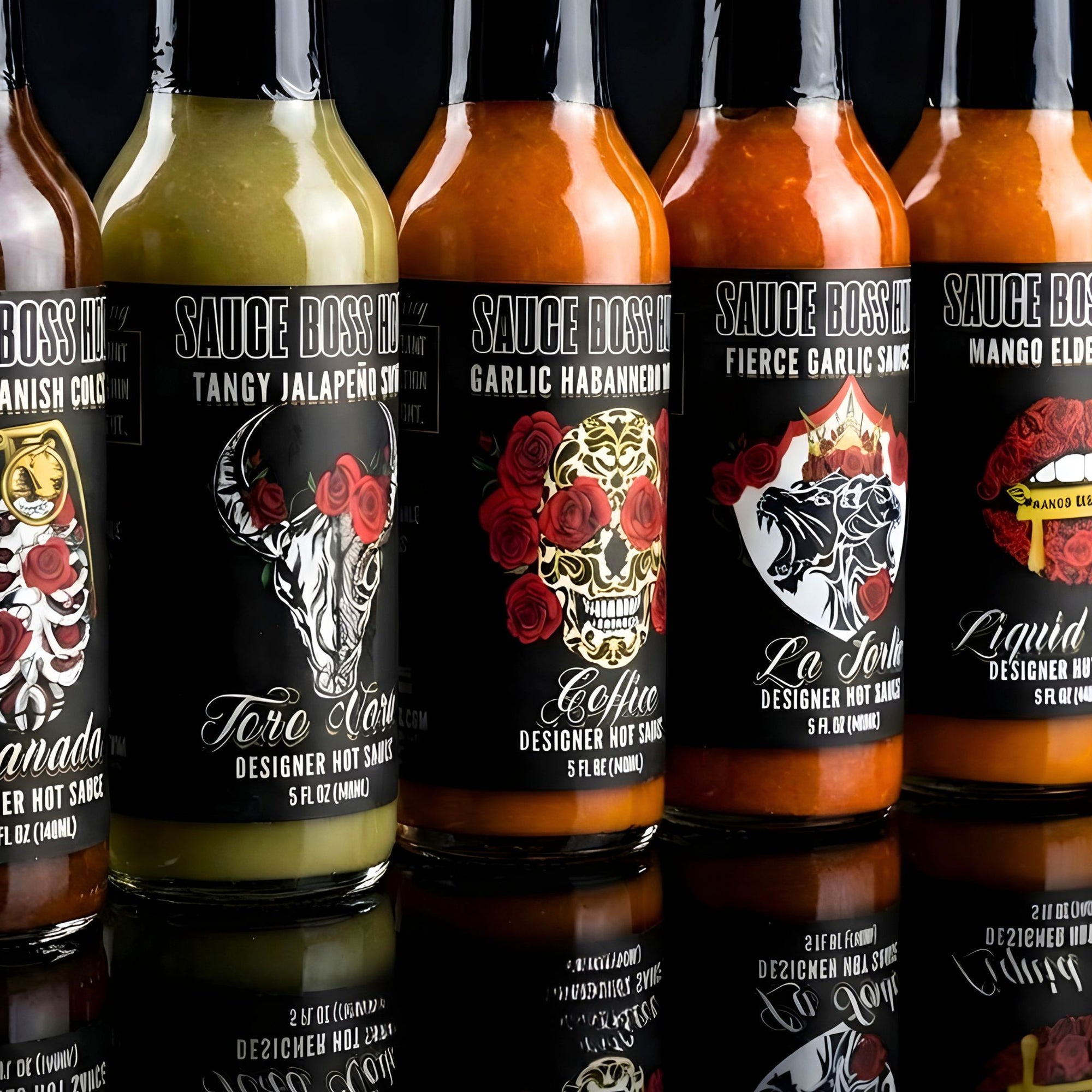 Row of Sauce Boss hot sauce bottles with various labels on a reflective surface.