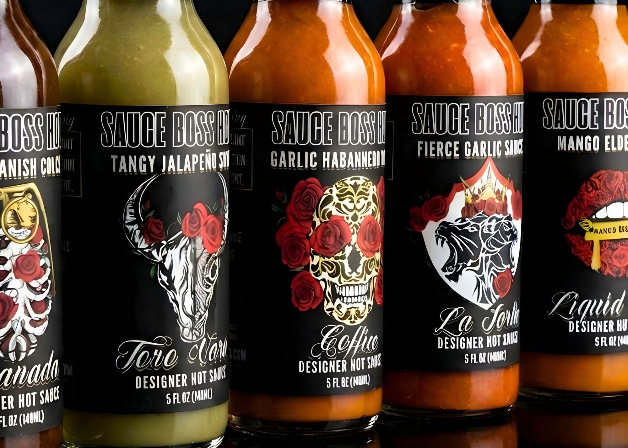 Row of Sauce Boss hot sauce bottles with various labels on a reflective surface.