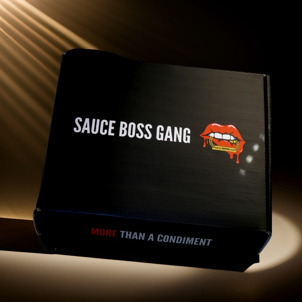 Sauce Boss Gang &quot;The Whole Gang &quot; hot sauce collection gift box front view.