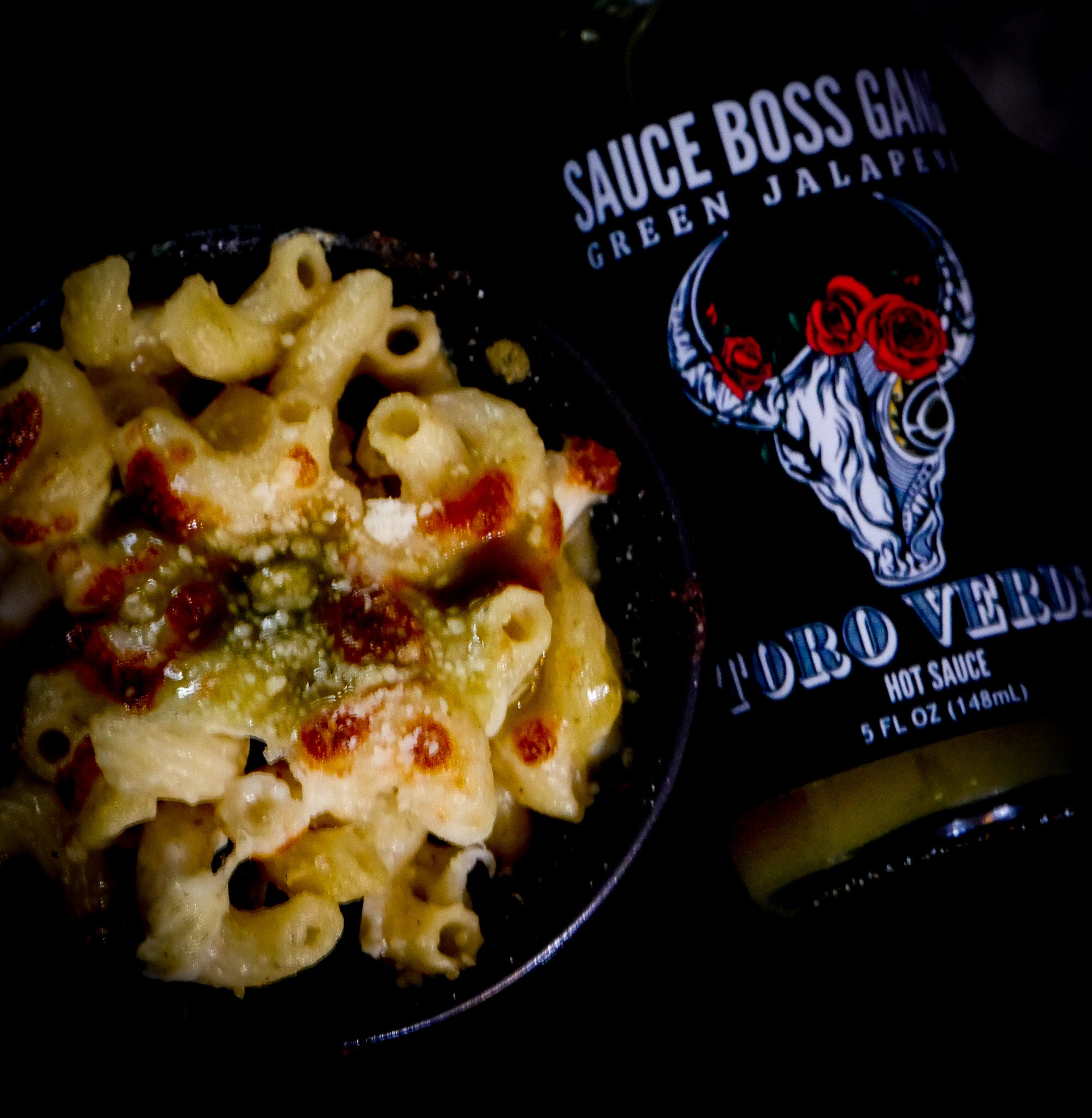 Sauce Boss Gang "salsa verde" hot sauce on mac and cheese.