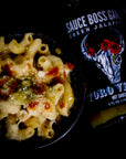 Sauce Boss Gang "salsa verde" hot sauce on mac and cheese.