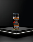 Jar of Dirty Churro Espresso Sugar on a black platform with a dark background