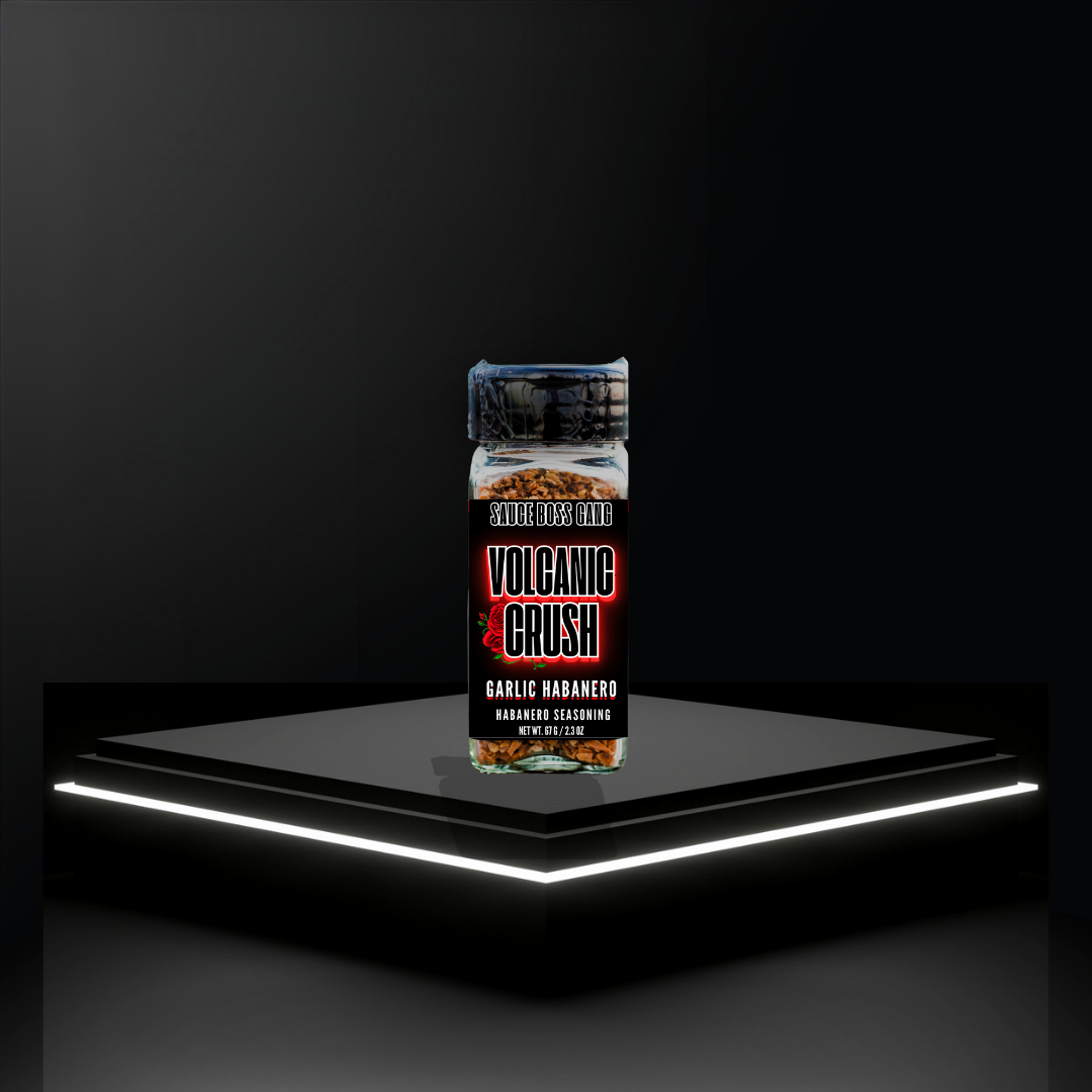 Crushed habanero seasoning on a black platform with a dark background