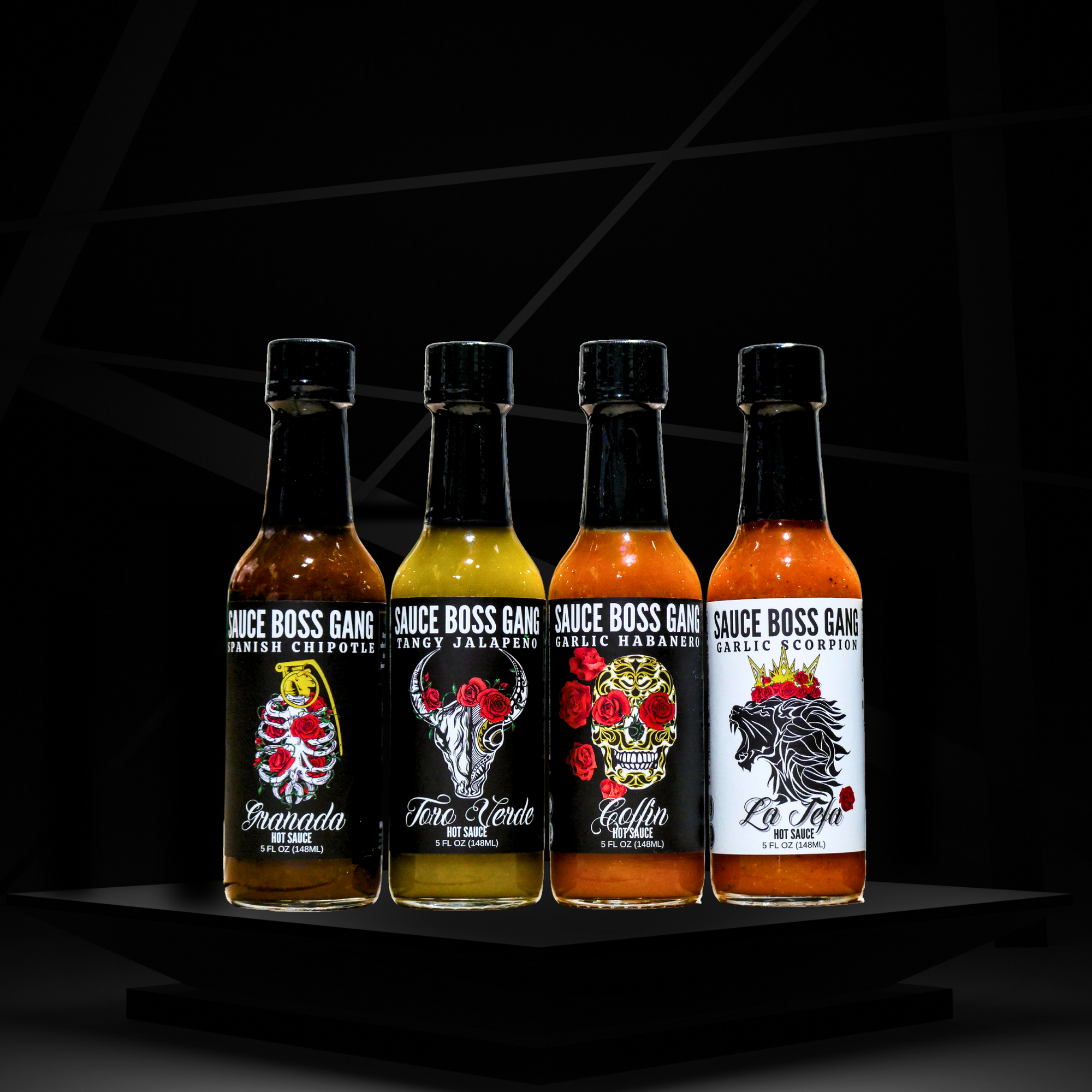 The whole gang vegan hot sauce collection bottles front view