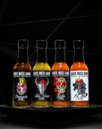 Sauce Boss Gang "the whole gang " hot sauce collection bottles front view.