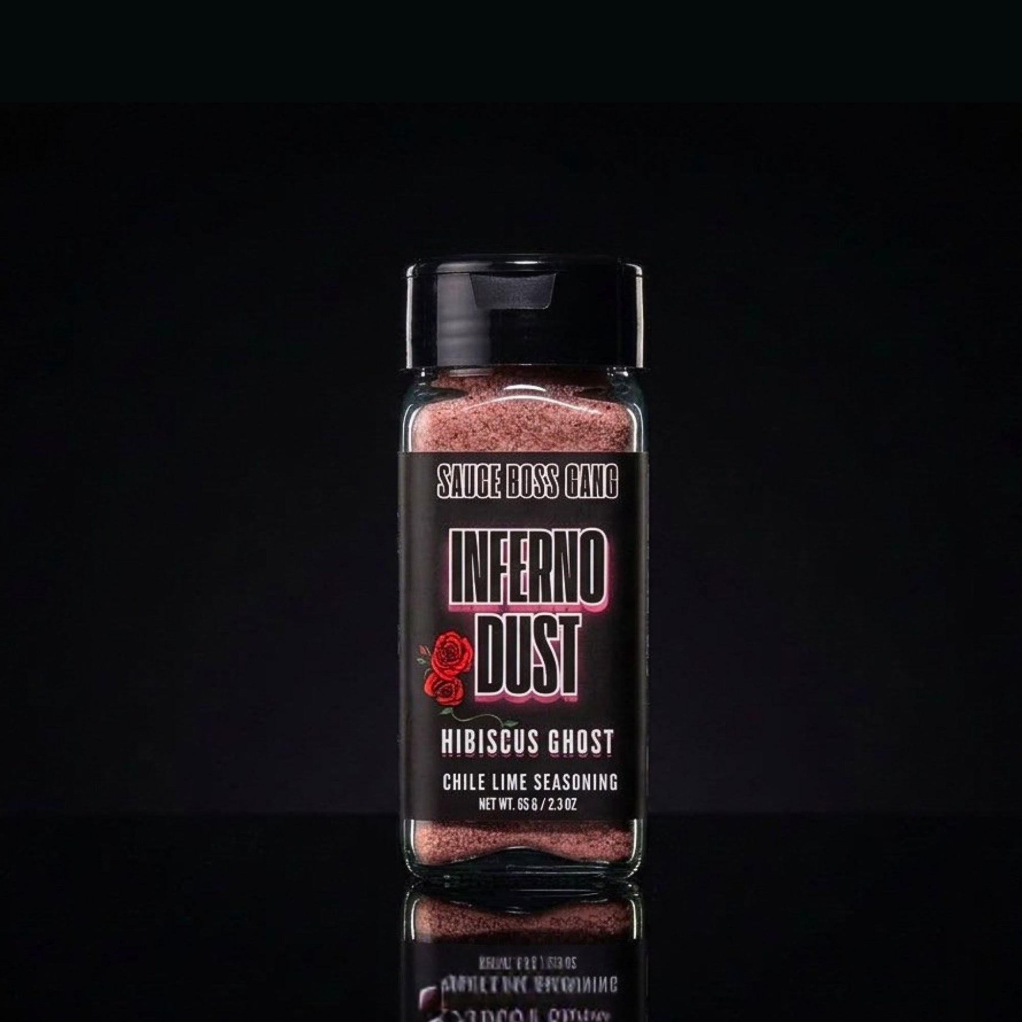 Spice container labeled 'Inferno Dust' on a black background