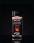 Spice container labeled 'Tropical Tease' with a black background