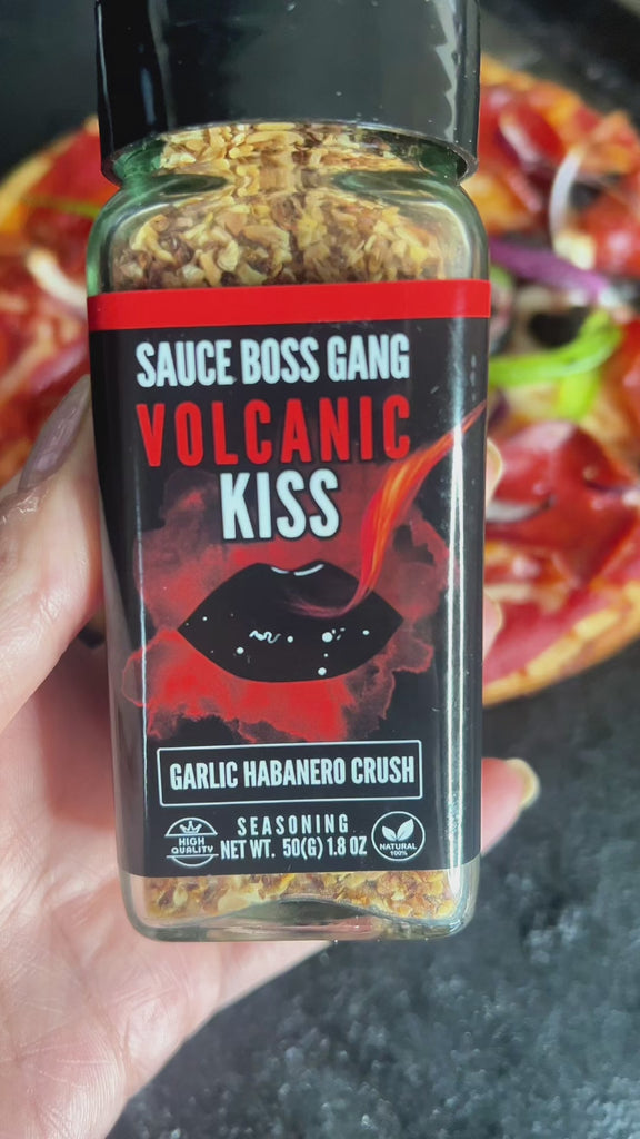 Video of Sauce Boss Gang Volcanic Kiss seasoning on pizza.